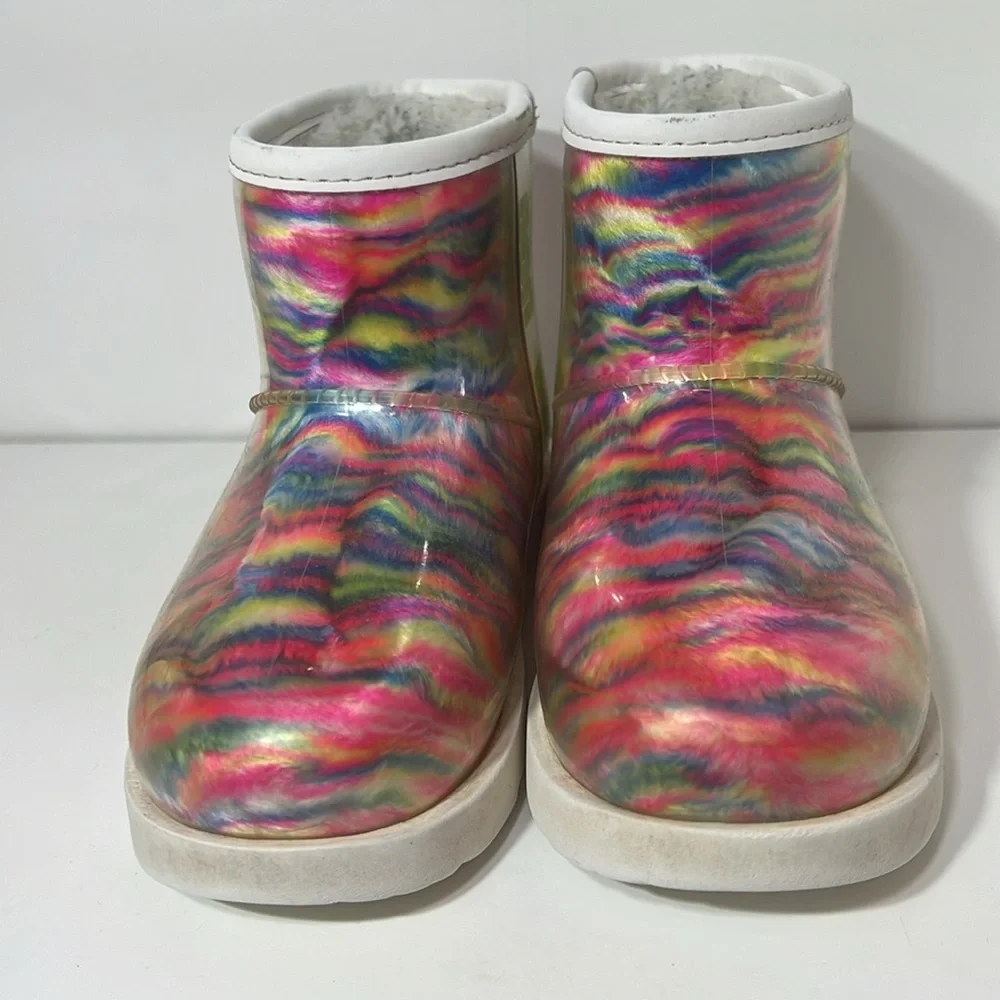 Girls Uggs Classic Clear mini boot in rainbow pattern.
